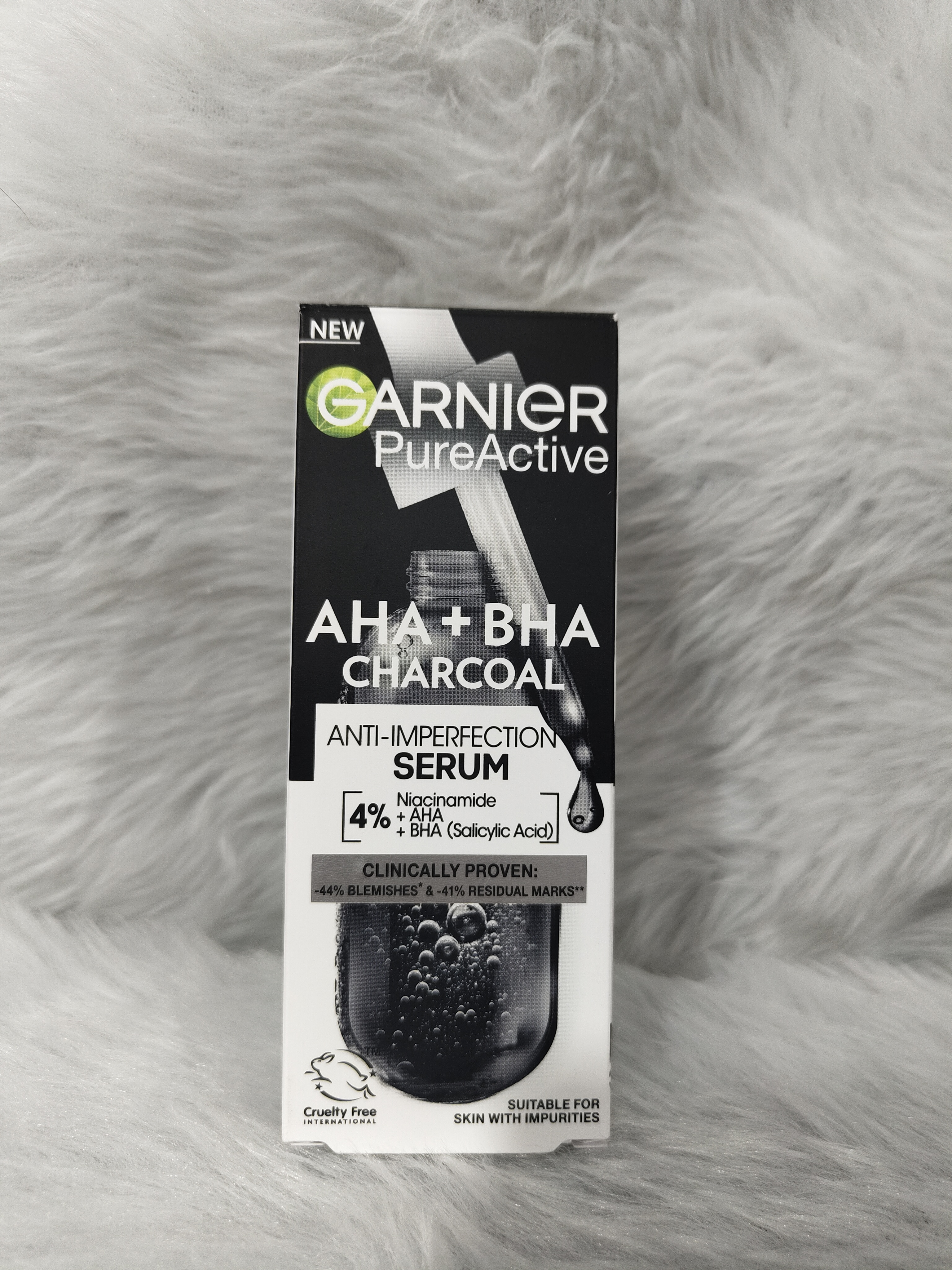 سرم لایه بردار زغال BHA+AHA و نیاسینامید گارنیر